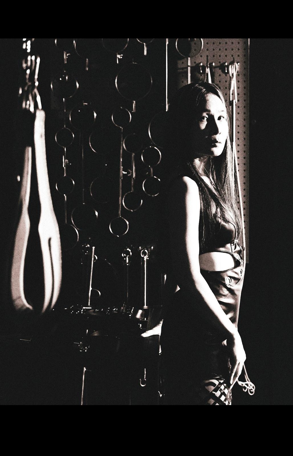 Empress Nyx in the atelier of instruments — monochrome, in profile